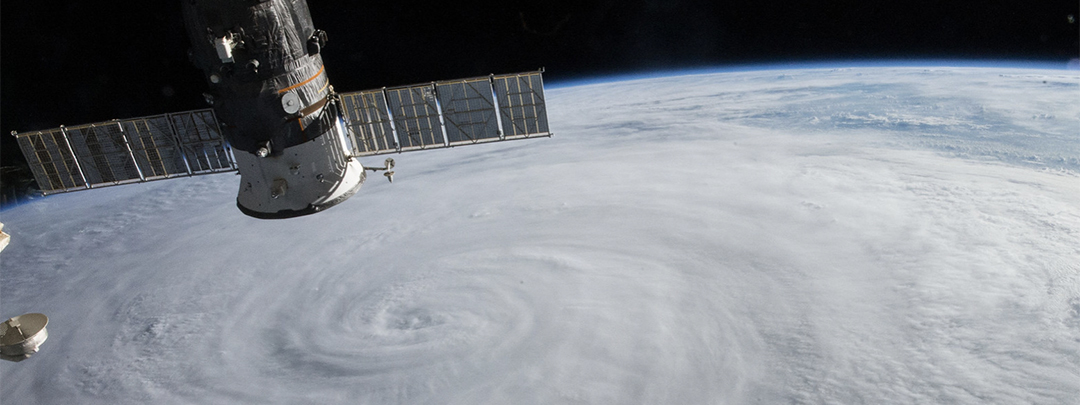 Satellite Orbiting Above Storm